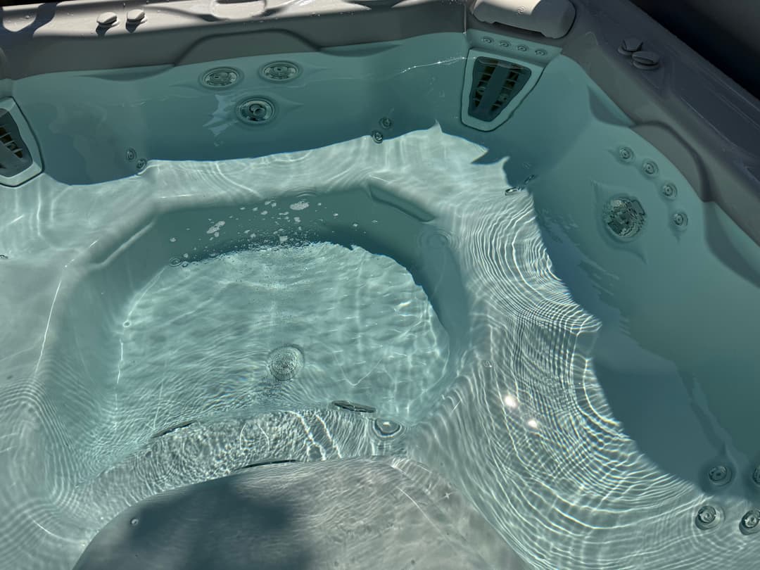 Spa water balanced and cleaned during routine spa maintenance