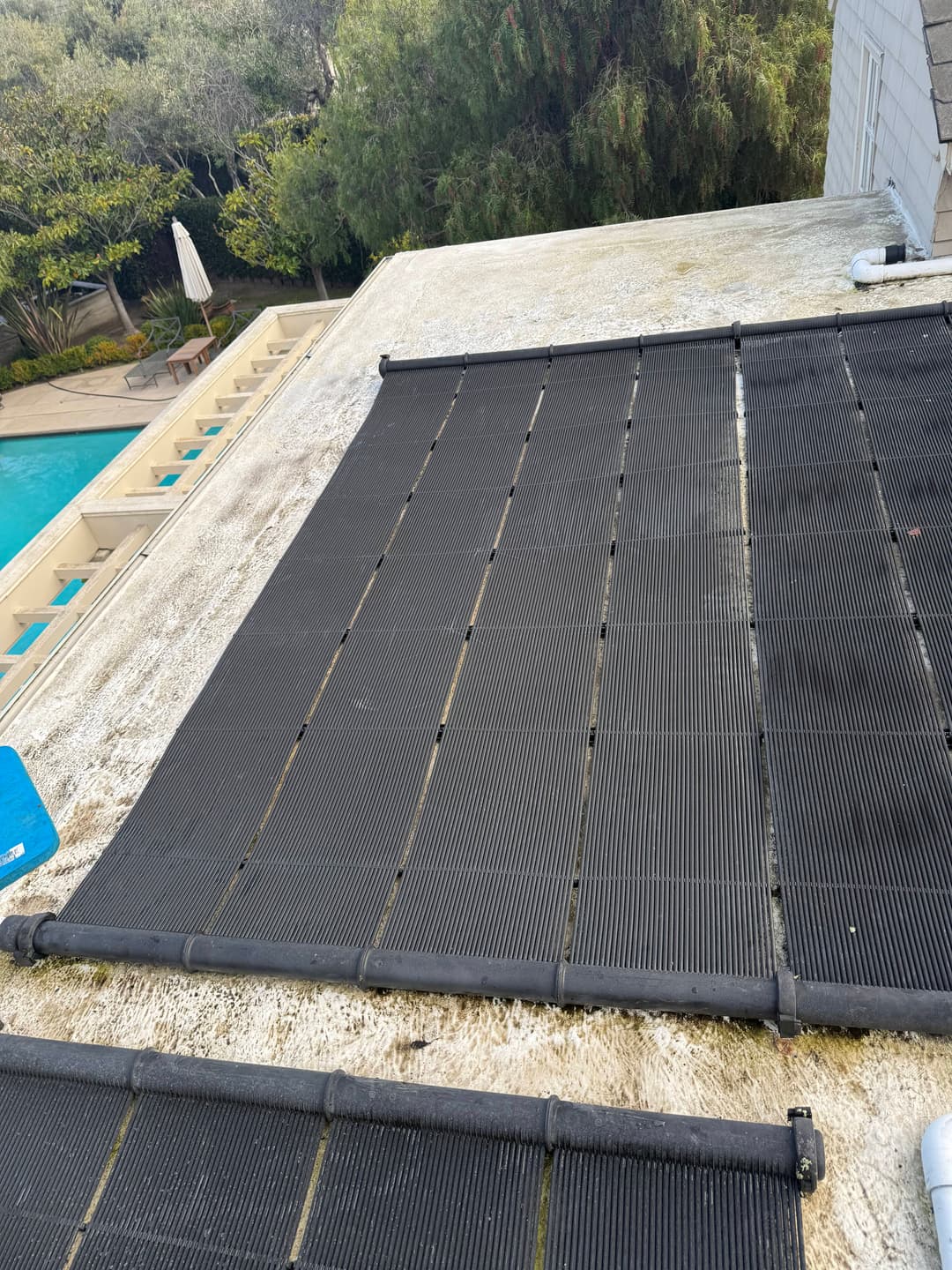 Pool cover installed and secured after maintenance and inspection