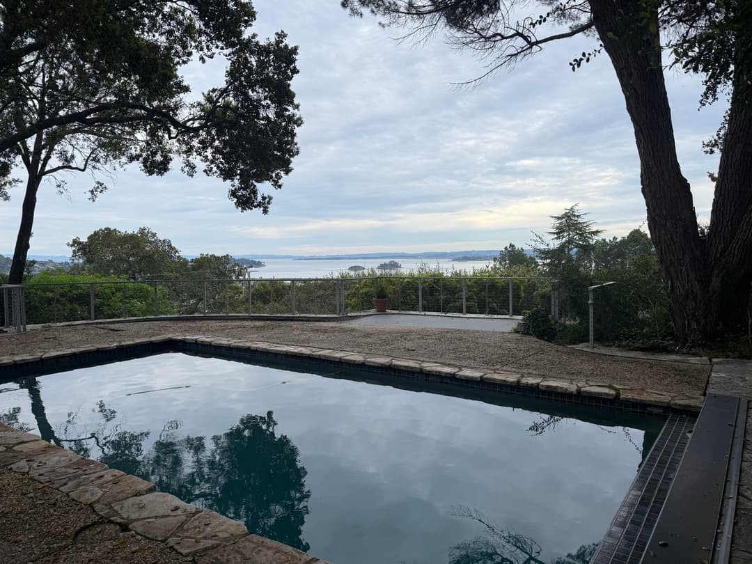 Pool overlooking San Francisco Bay from Marin County hillside property serviced by Sel Marin Pool Service